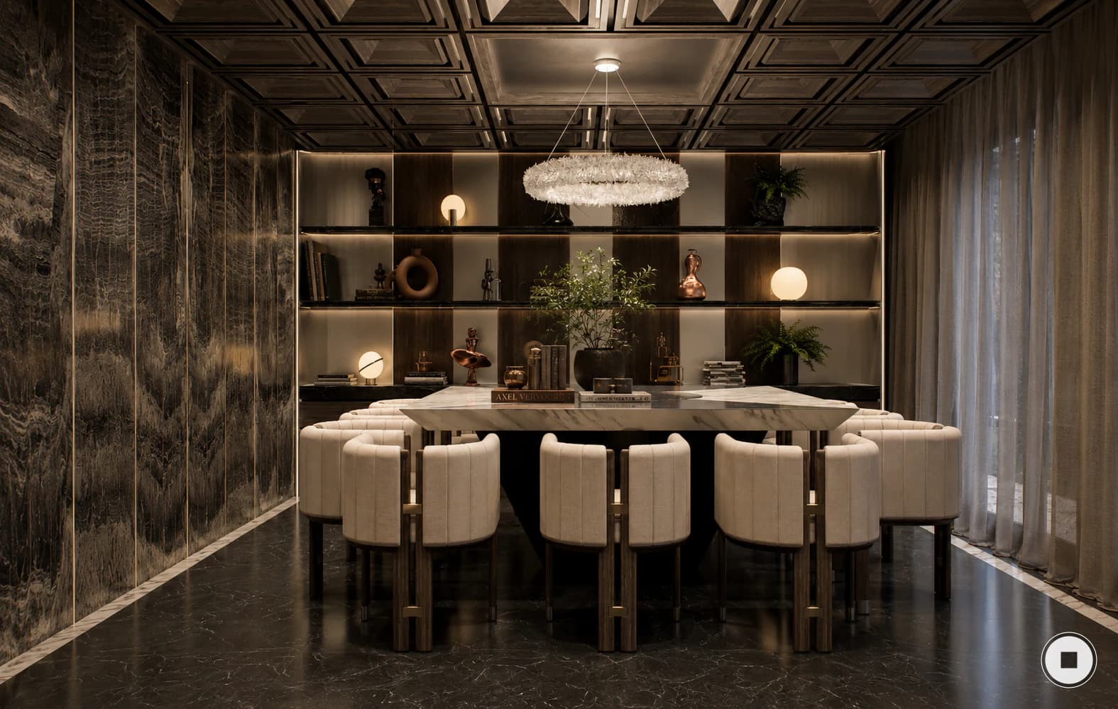 Comedor de SKV-18 con mesa diseñada a medida y luminaria central.
